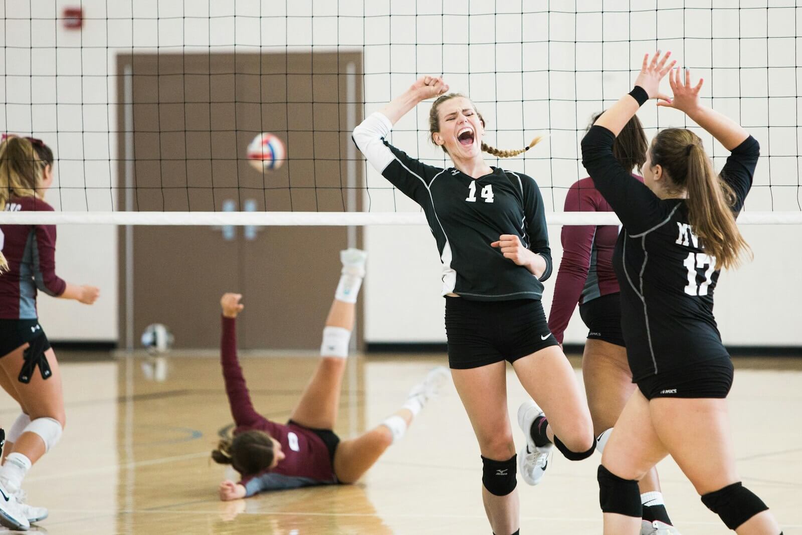 Champions Volleyball athlete celebrating a point